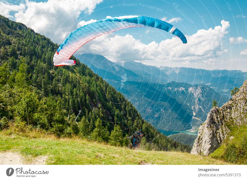 Paragliding from the Jennergrat, launch for paragliders and the alpine via ferrata Schützensteig Klettersteig. Mountain Jenner, Berchtesgadener Land, Bavaria, Germany