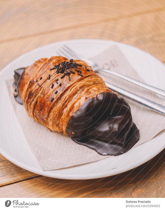 Butter and chocolate croissant, typical of French and Mediterranean pastries background bake bakery biscuit bread breakfast brioche brown bun butter buttered