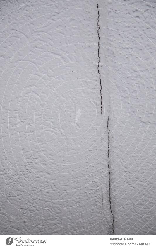 House wall with crack - "there is a crack going through Germany". Wall (building) White structure Crack & Rip & Tear Vertical Detail Material Surface Old Rough