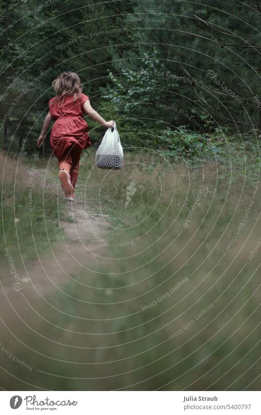 Quickly away... Dress grasses Loneliness Relaxation Orange questing Green Walking path Forest Trail Summer Girl To go for a walk mesh pocket forest path Calm
