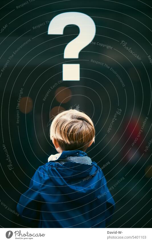 Child asks himself a question Question mark Meditative Perplexed asking Perplexity Irritation why ? Anonymous Rear view Boy (child) disorientation