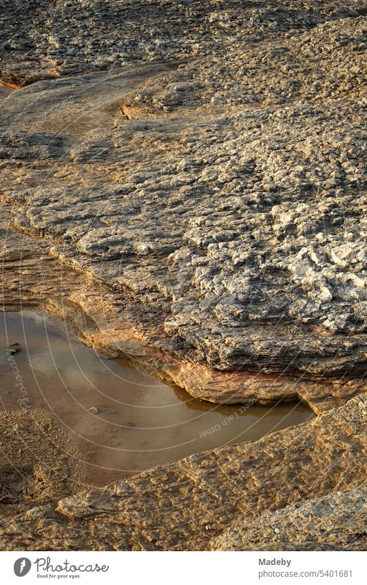 Erosion of pink rock in summer sunshine on the Black Sea coast in Kefken in Kocaeli in Turkey Boulders boulders Brocken Bay Sunlight rock formation