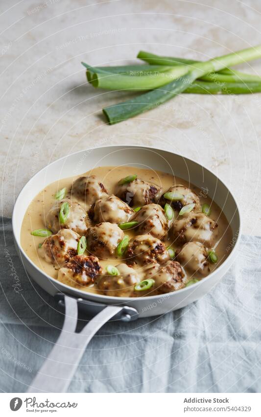 Delicious Sweden meatballs with green onions dish sauce gravy appetizing delicious pan culinary cuisine recipe sweden tradition nordic cuisine tasty utensil