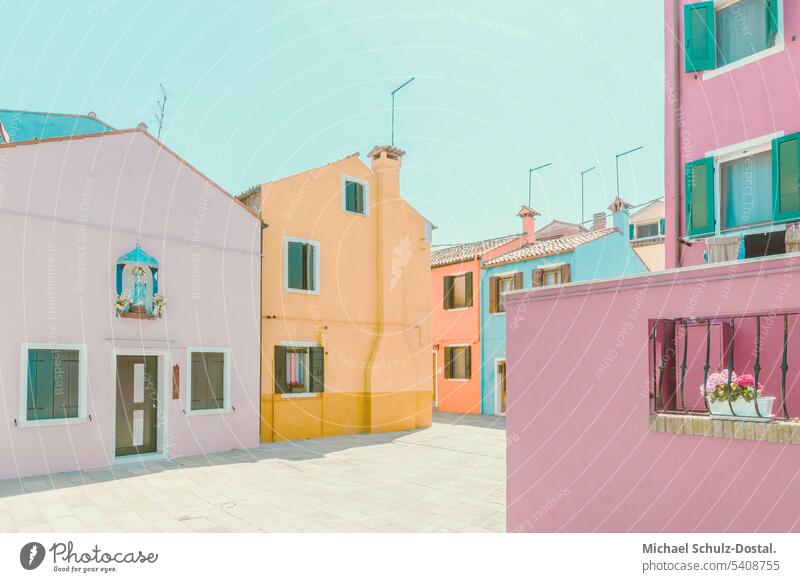 pastel colored fishermen houses on a square on a venetian island Venice Colour variegated Water harmony mint green Mint green House (Residential Structure)