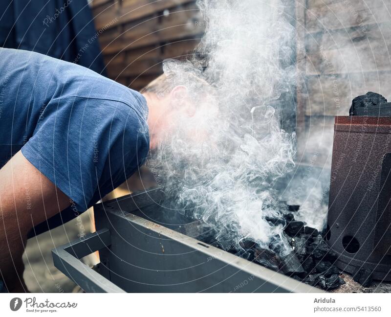 smoking manikin Man Smoke smoke Barbecue (apparatus) blow BBQ Ignite Fire Coal Head BBQ season Charcoal (cooking) Summer