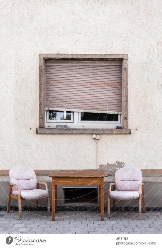 Place of rest Relaxation Chair house wall Window Roller shutter Old Alternative run-down Table relaxation Facade Town makeshift Apartment Building at home