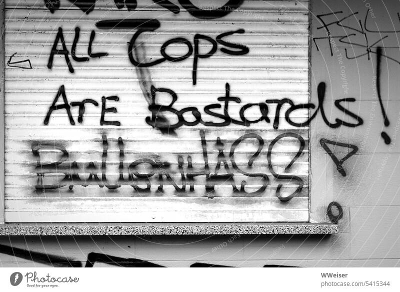 Some people have a strong dislike for police officers Police Force Police Officer Graffiti writing Bulls Cop Hate Anger Hatred Slogan Characters Wall (barrier)