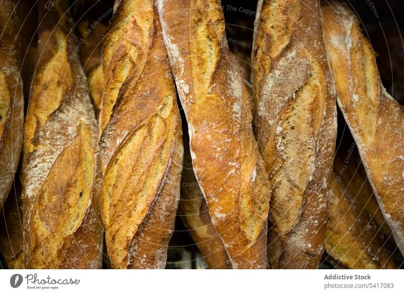 Traditional crusty French bread baguette bakery shop french fresh food traditional delicious gourmet loaf brown flour cereal wheat appetizing savory pastry