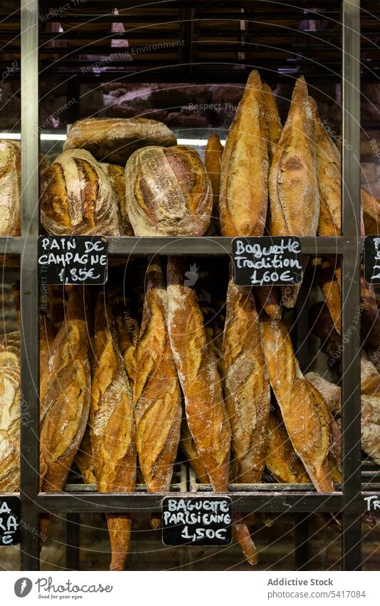 Traditional crusty French bread baguette bakery shop french fresh food traditional delicious gourmet loaf brown flour cereal wheat appetizing savory pastry