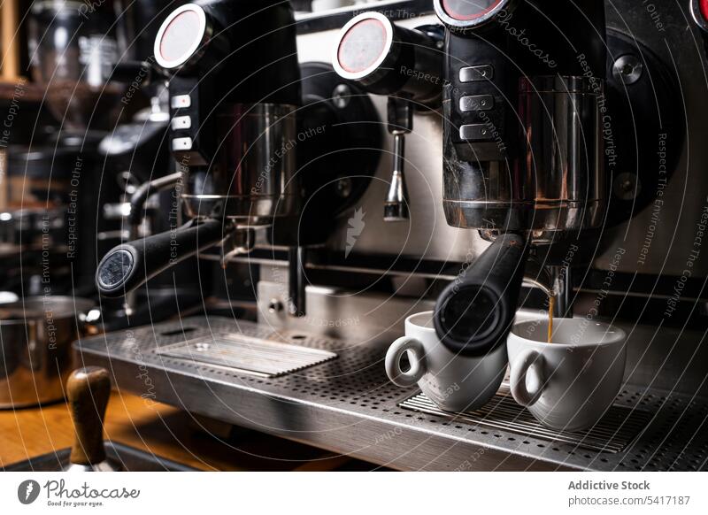 Process of making coffee machine professional equipment cafe shop bar beverage italian brewing dispensing pouring water hot caffeine drink cappuccino espresso
