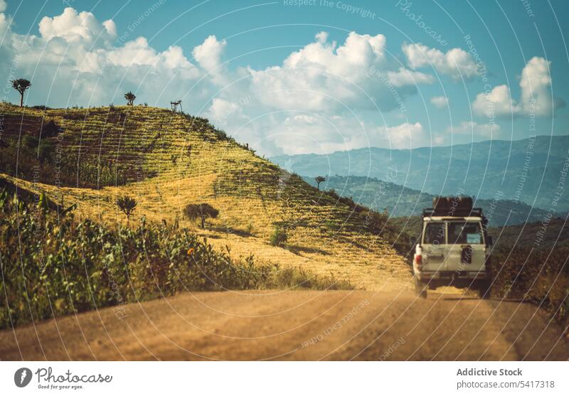 Car driving on road in tropical rural mountains landscape car drive travel tourism ethiopia africa trip living valley range journey freedom nature