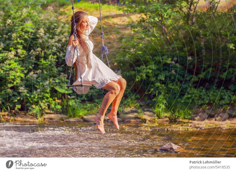 hanging section Woman youthful Human being person Swing To swing Summer Nature Landscape Picture book Movement Freiburg Germany Baden-Wuerttemberg whole body
