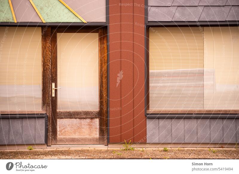 Store row in faded colors and charming vintage look Store premises Vacancy Retro Charming business Facade Crisis Insolvency Shop window Retail sector