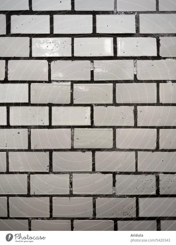 Tiled wall Wall (building) Facade Public restroom Bathroom White interstices