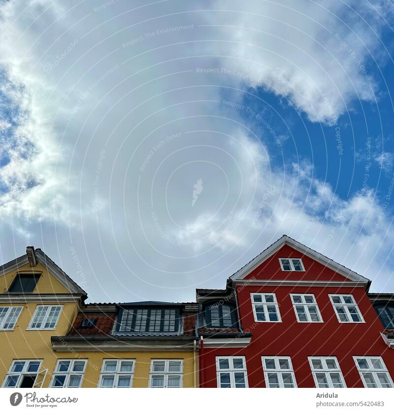 Red and yellow house facade with big cloud against blue sky houses Facade Window Town cityscape Copenhagen House (Residential Structure) facade color Yellow