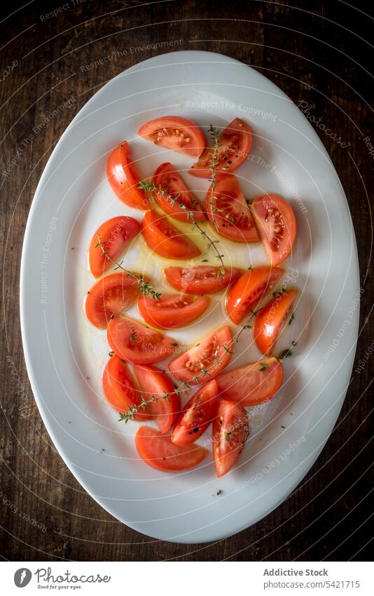Tasty tomato slices on plate on table herb serve ripe piece vegetable delicious food meal tasty fresh dish wooden appetizing healthy healthy food vegetarian
