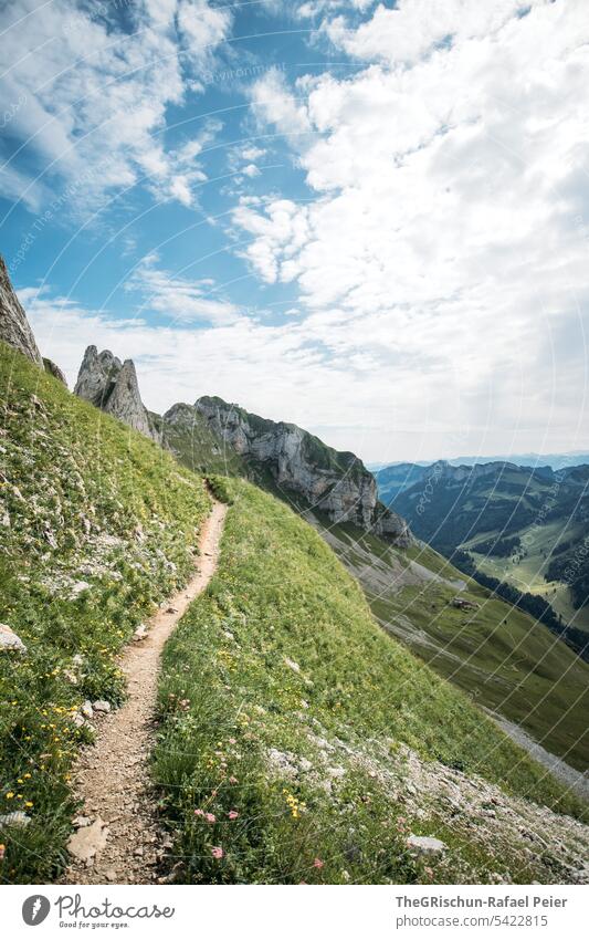Mountains with path on steep slope Vantage point Panorama (View) Sky Clouds Alpstein hiking country appenzellerland Appenzell mountain Grass stones Rock Walking