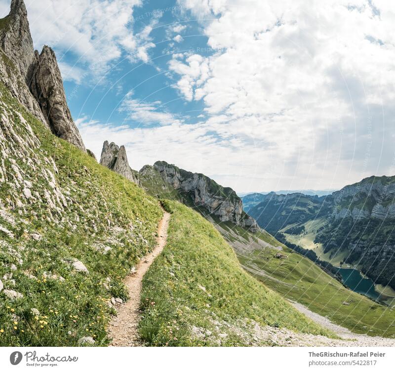 Mountains with path on steep slope Vantage point Panorama (View) Sky Clouds Alpstein hiking country appenzellerland Appenzell mountain Grass stones Rock Walking
