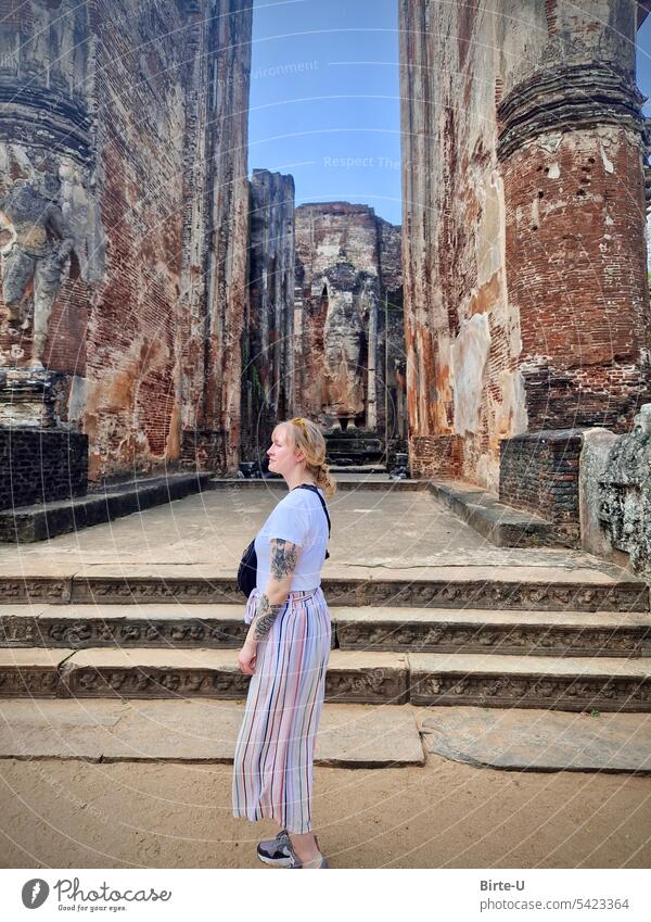 Young woman in front of a temple in Sri Lanka vacation Temple Vacation mood Culture Long distance travel Summer Historic Landmark Vacation & Travel Architecture