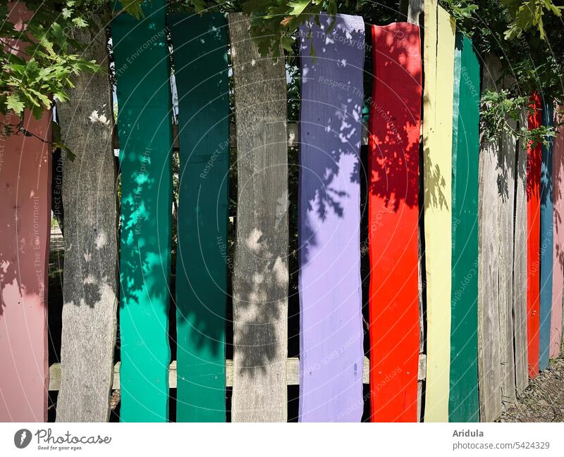 Colorful fence slats with shadow play Fence Wood variegated Shadow Kindergarten Playground children laths lattice fence