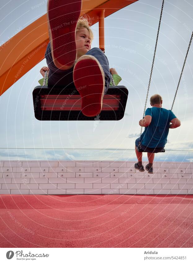 Back and forth in the wind with a view Child Swing To swing Father dad Playground rooftop Sky Infancy Playing Movement Wind