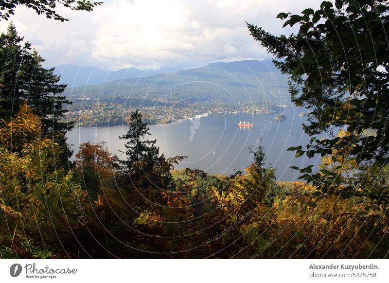 View on the Pacific Ocean inlet and mountains from the Burnaby Mountain, British Columbia, Canada Vancouver West Coast ocean sea view fall autumn