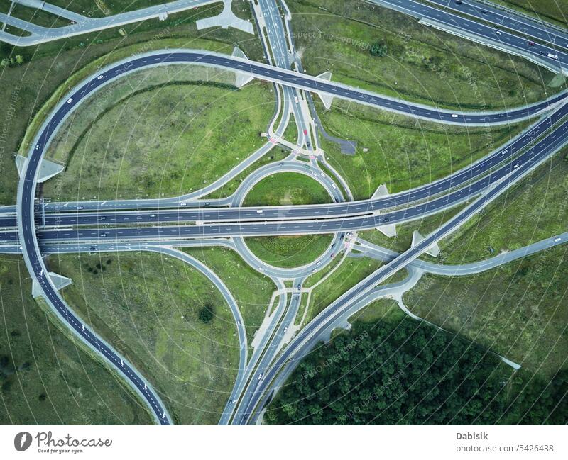 Roundabout intersection with car traffic road intersection roundabout infrastructure junction vehicle transportation aerial view poland wroclaw above rush hour