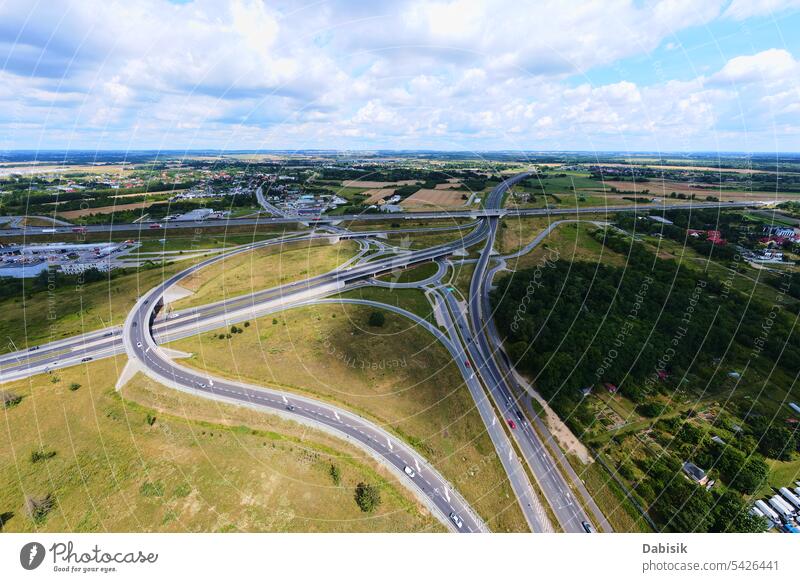 Roundabout intersection with car traffic road intersection roundabout infrastructure junction vehicle transportation aerial view poland wroclaw above rush hour