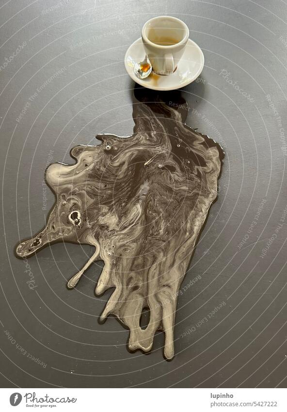 Espresso stain on dark table top blob Break Tabletop Slate Artistic Figure Face Abstract break Cup esoresso cup