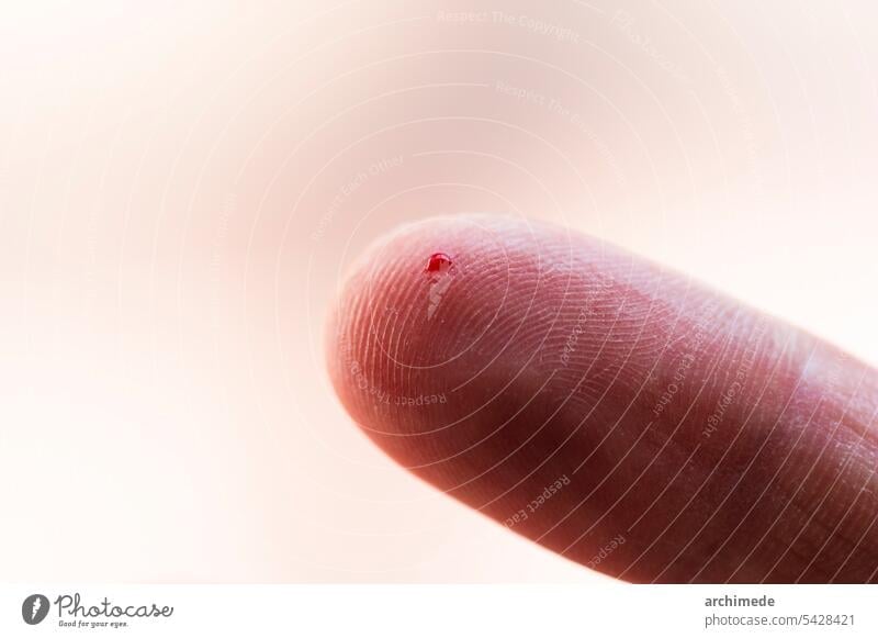 Blood on the finger anonymous blood body check detail diabetes drop fingerprints hand healthcare index macro medicine skin small sugar tiny tip wound