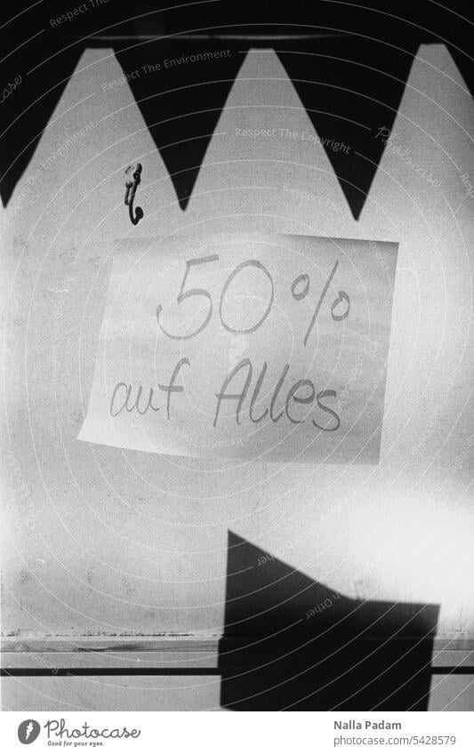50% off everything Analog Analogue photo B/W black-and-white writing Leaf Paper Shop window Empty Text Shadow Prongs Clue Percent
