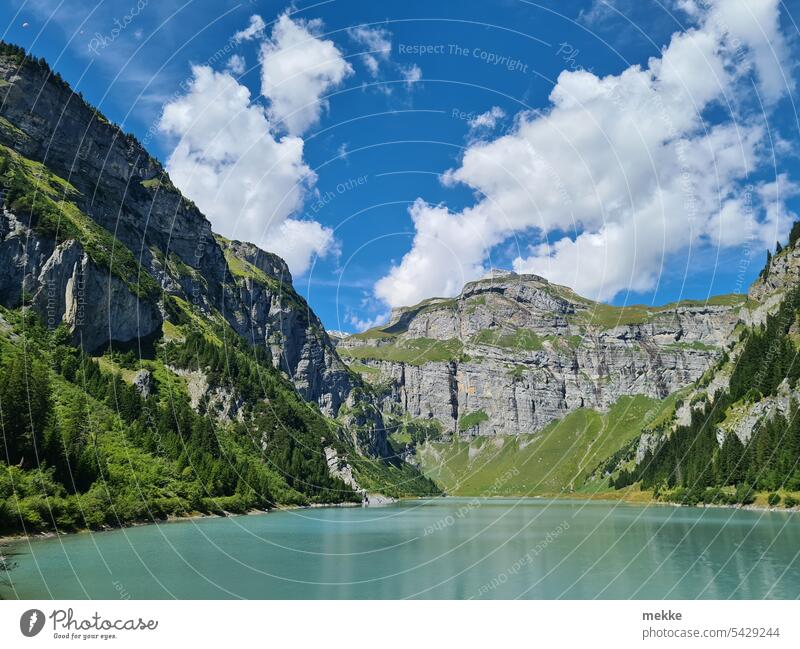 Something against the November gloom Alps Reservoir Mountain Landscape Lake Water Blue Nature Summer Hiking Rock panorama Clouds Peak Sky Tourism