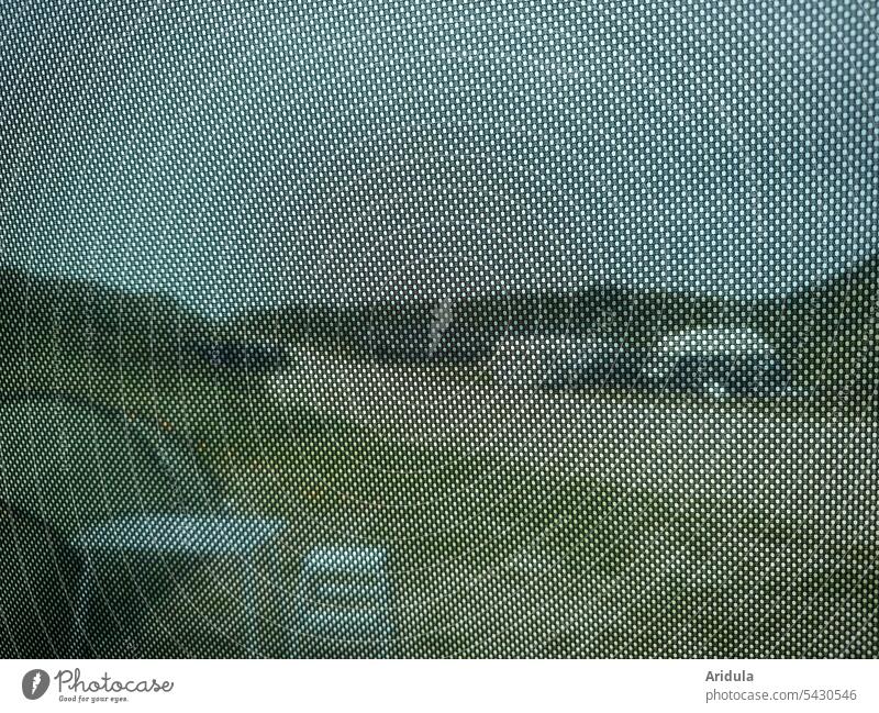 View through the darkened car window to a camping site between overgrown dunes at the North Sea Camping site Vacation & Travel Caravan Mobile home Tourism