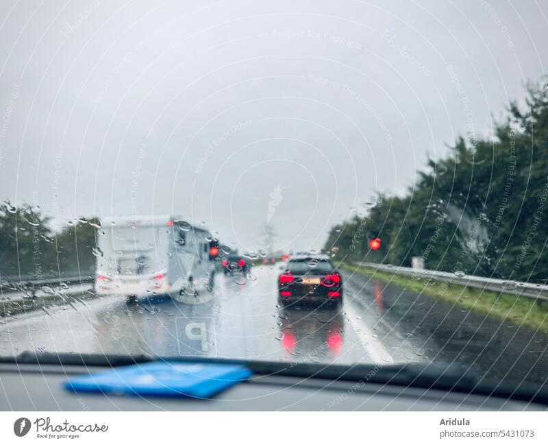 Traveling back | Driving in the rain on the highway Itinerary Highway car Mobile home Rain Rear light Street Car Transport Motoring Traffic infrastructure
