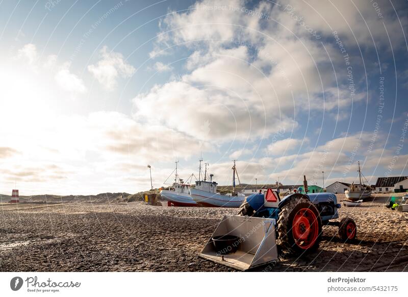 Tractor with fishing boat backlit on Vorupør beach in Denmark at sunrise Sand Colour photo Relaxation Beach life Vacation & Travel bathe Recreation area