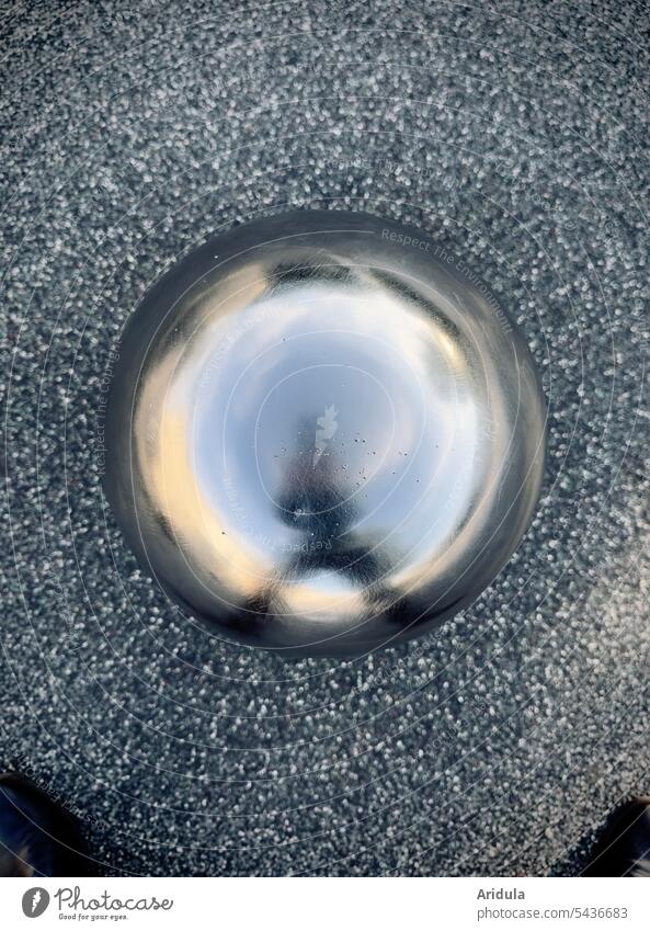 Stainless steel ball on asphalt Sphere High-grade steel Asphalt urban Park Street City Sculpture Exterior shot