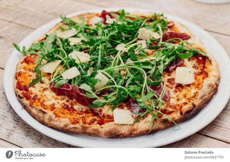 The real Neapolitan pizza with top quality fresh ingredients appetizer arugula background baked cheese closeup crust crusty cuisine culture delicious dinner eat