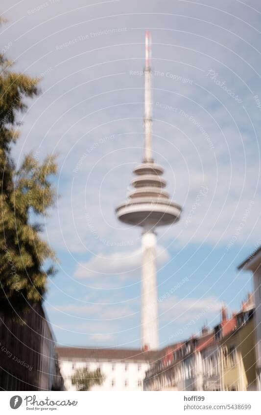 blurred out-of-focus view of a television tower Unsharp blurred Television tower ICM Transmitting station ICM technology vibrating Modern architecture