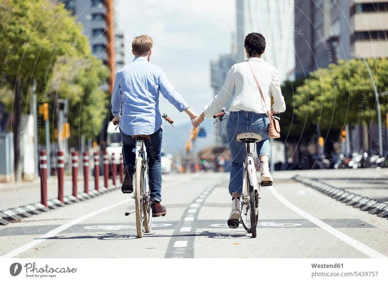 Couple with bikes in Barcelona human human being human beings humans person persons caucasian appearance caucasian ethnicity european 2 2 people 2 persons two