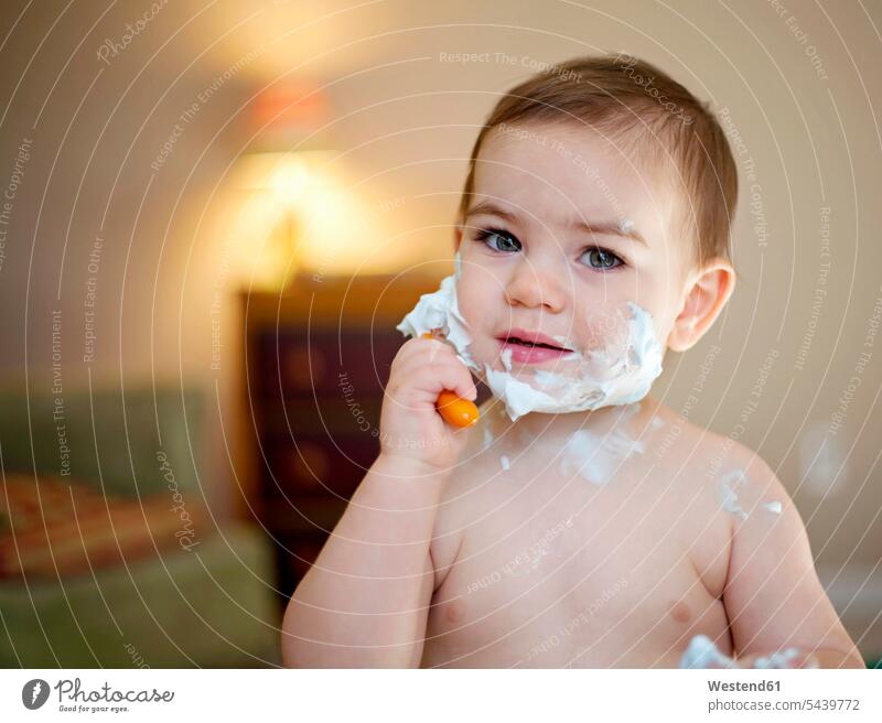 Portrait of little boy shaving front view head-on frontal head on front views illuminated lighted caucasian european caucasian ethnicity caucasian appearance