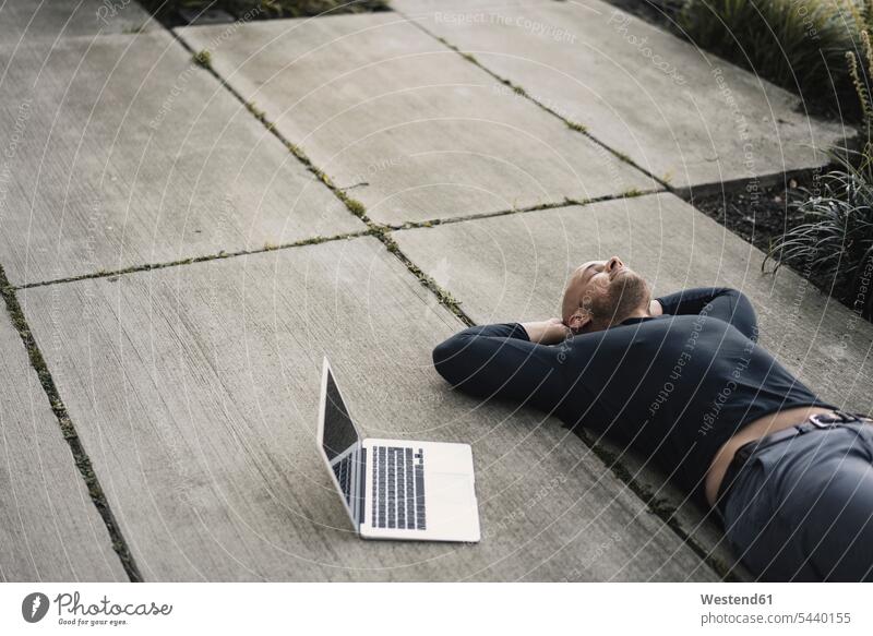 Man with laptop having a break human human being human beings humans person persons caucasian appearance caucasian ethnicity european 1 one person only