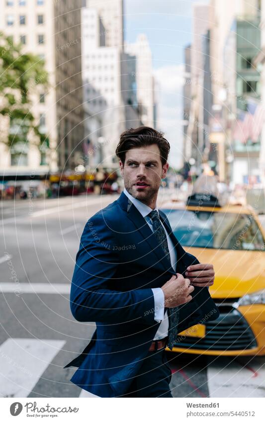 Handsome businessman walking in Manhattan attractive beautiful pretty good-looking Attractiveness cool attitude composed coolness laid-back commuter commuters