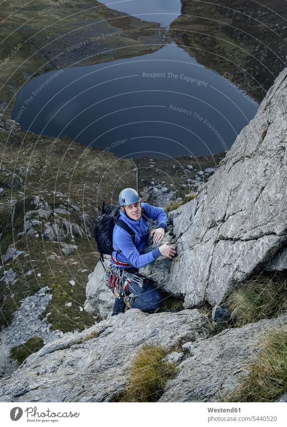 UK, North Wales, Snowdonia, Craig Cwm Silyn, mountaineer on Outside Edge Route climbing climber alpinists climbers Mountain Climber mountaineers