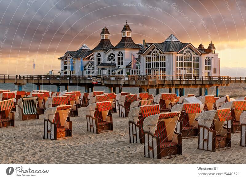 Germany, Mecklenburg-Western Pomerania, Baltic sea seaside resort Sellin, Hooded beach chairs on the beach hooded beach chair roofed wicker beach chair
