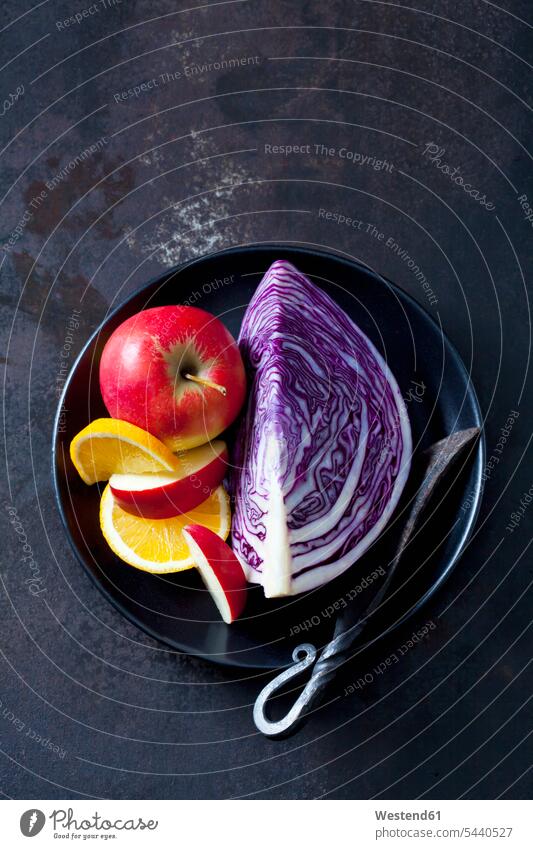 Bowl of sliced red cabbage, apples and orange slices nobody Fruit Fruits Bowls red apple red apples Apple Apples Red Cabbage Purple Cabbage copy space vitamines