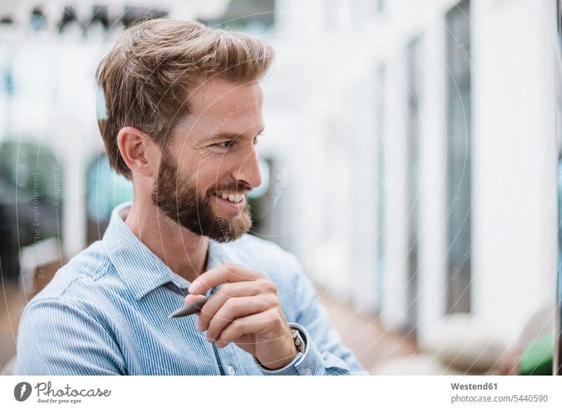 Portrait of smiling businessman smile beard Businessman Business man Businessmen Business men portrait portraits males people persons human being humans