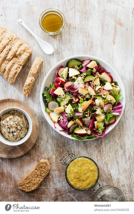 Mixed salad, bread and dip food and drink Nutrition Alimentation Food and Drinks mixed salad Radicchio Radicchio Salad lettuce sprouts dips pieces dressing