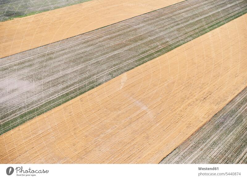USA, Aerial photograph of contour farming after harvest in Western Nebraska structure textures structures shape shapes stripes striped brown nature