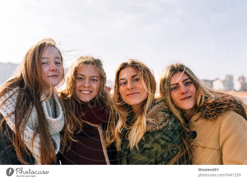 Portrait of four friends mate female friend portraits group foto Group Portrait Wind Windblown Windy smile human human being human beings humans person persons