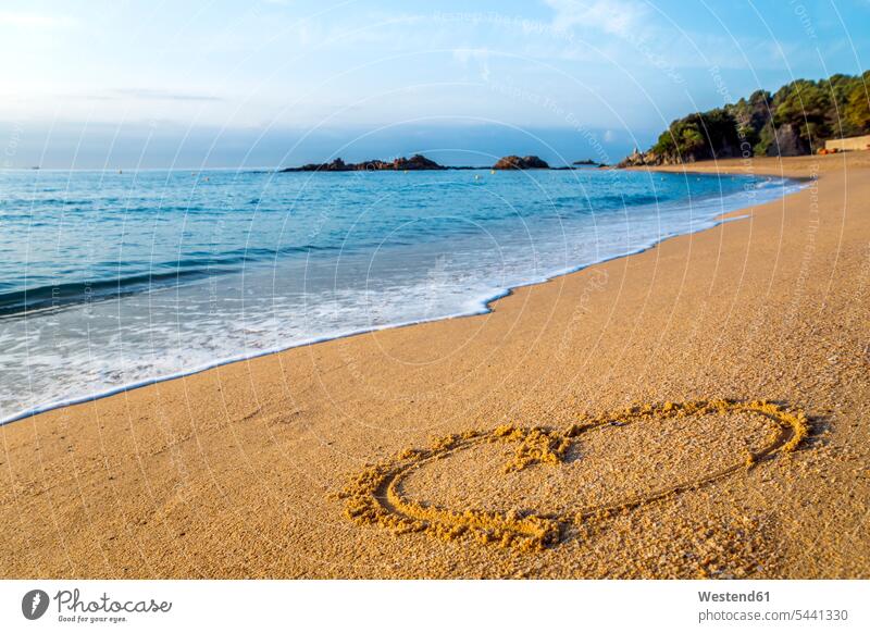 Spain, Catalonia, Lloret de Mar, heart drawn on the beach vacation holidays vacations nature natural world Girona Province wave waves outdoors outdoor shots